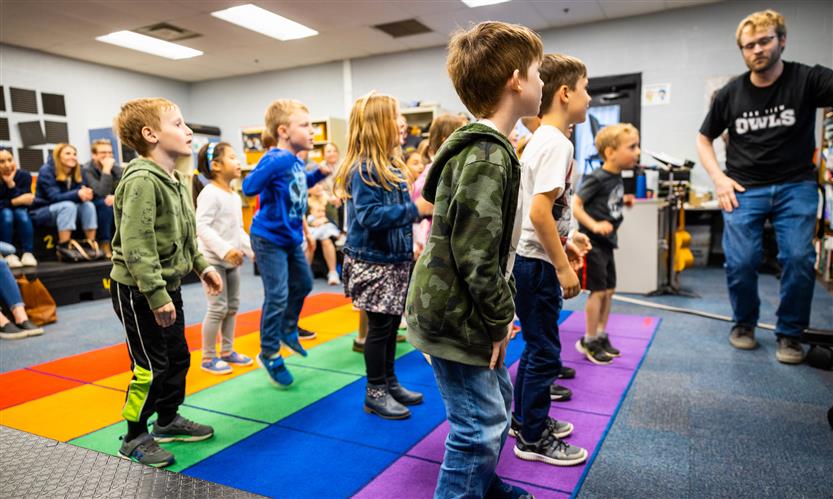 Students dance during music class